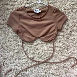 Princess Polly brown cropped tee that ties around. Size 0.